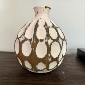 Cream colored distressed dot vase